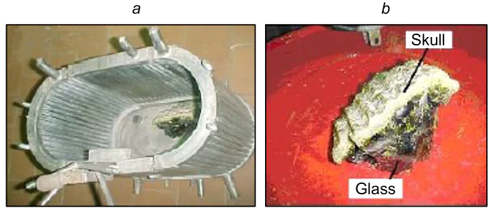 View of a cold crucible melter with a piece of glass manufactured in it (a) and a view of this piece with the protective layer made of glass batch material (skull) which separates the glass melt inside the cold crucible melter from its water-cooled tubes (b).36